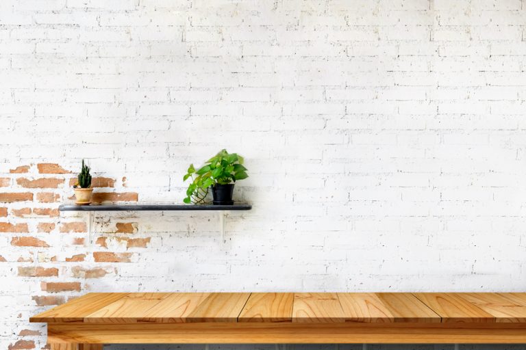 Paredes de tijolo aparente com os dois estilos